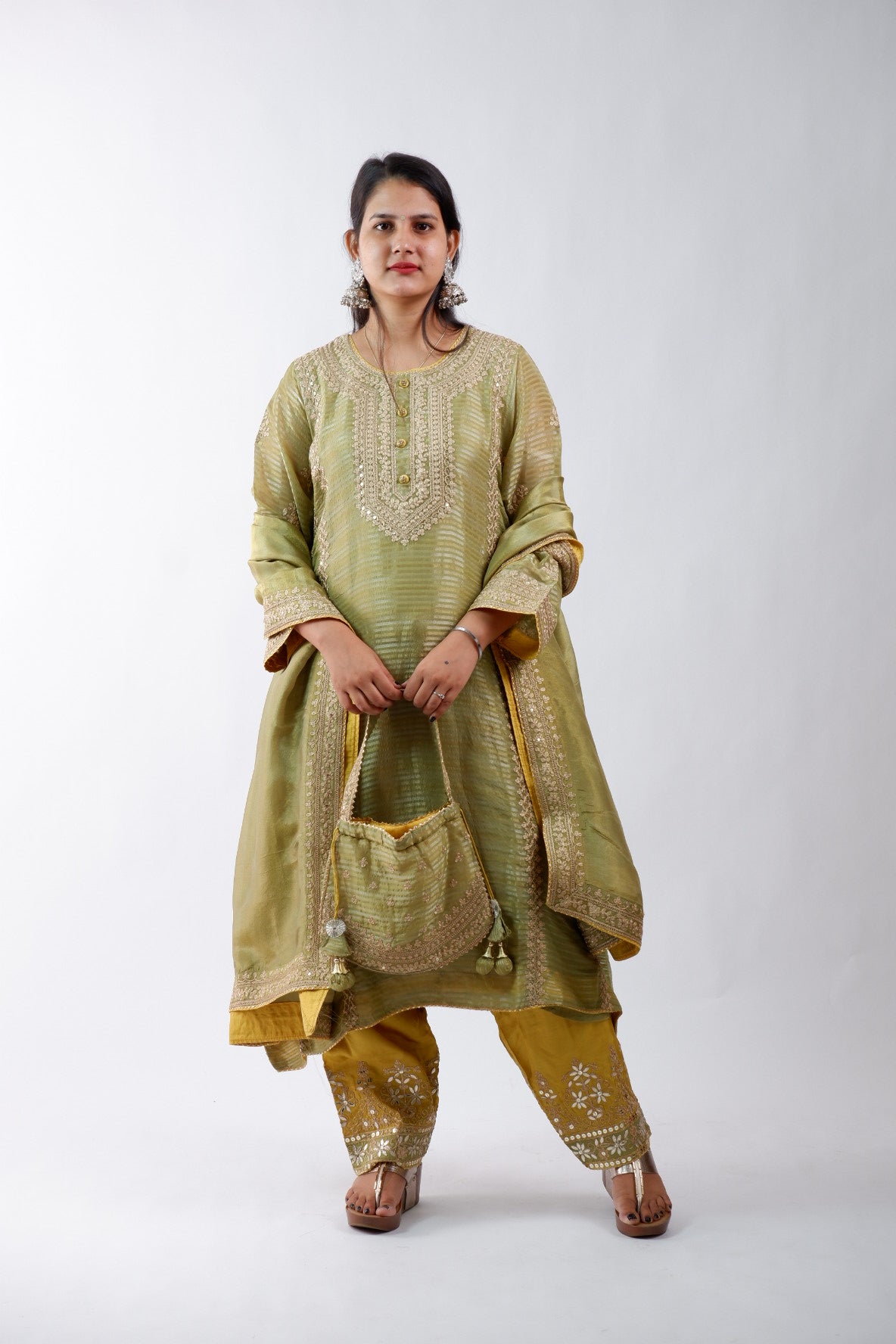 DH234-Olive GreenSuit With Intricate Golden Embroidery & Potli bag