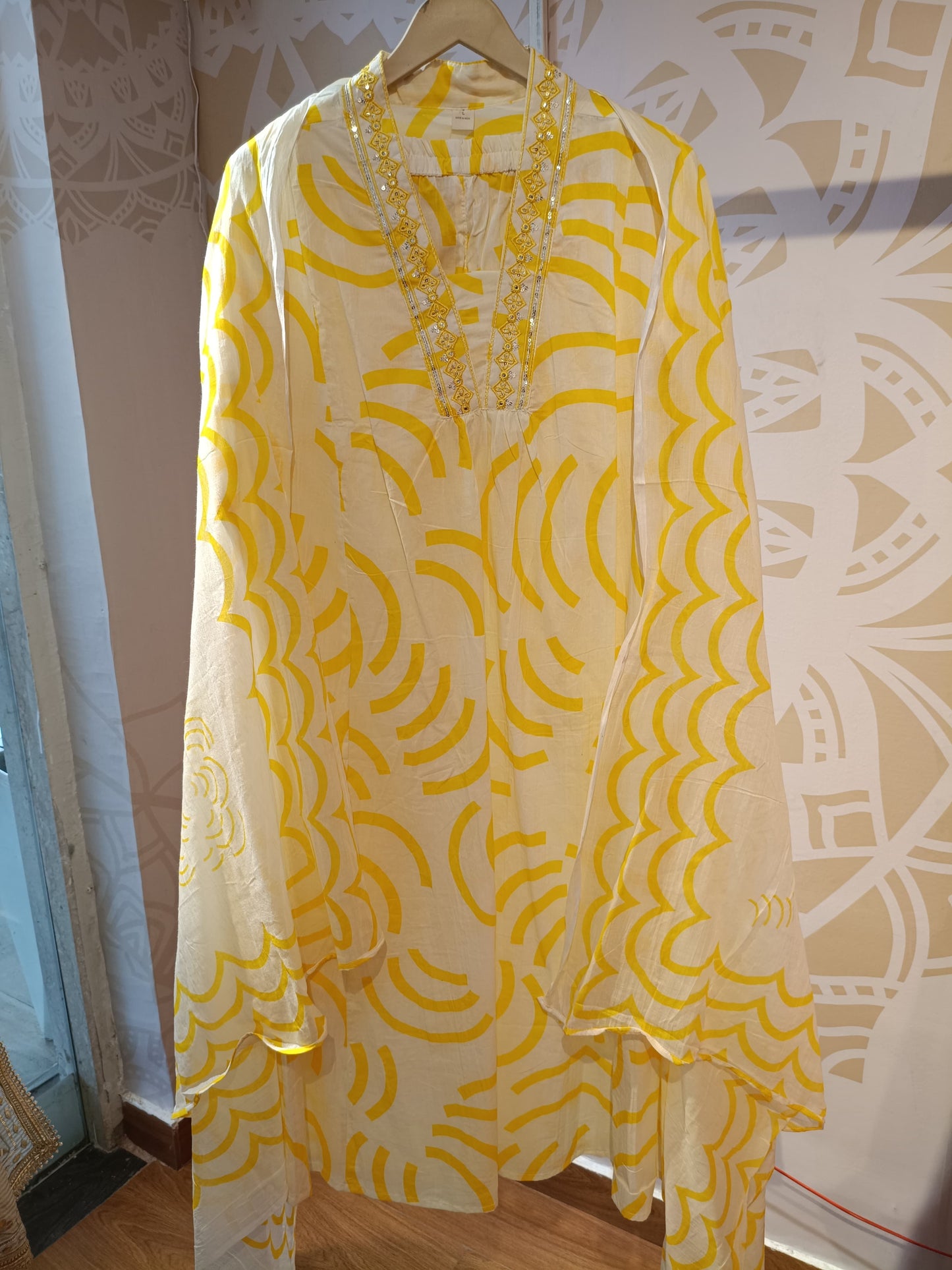 Cream and yellow cotton suit for women with embroidered neckline and abstract pattern