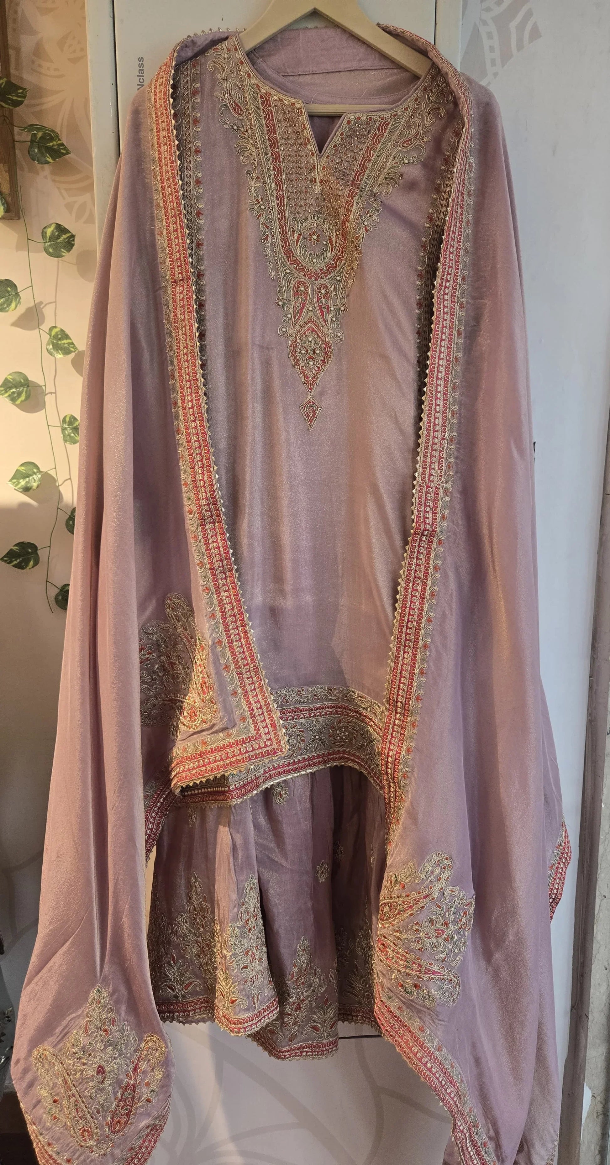 Elegant dusty pink festive garara set for women with intricate embroidery and matching dupatta