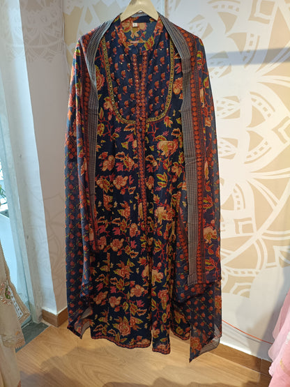 Navy floral cotton suit set with vibrant orange and pink flower patterns from Dharini's Store