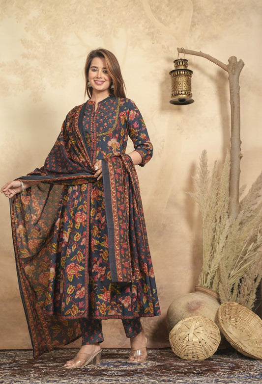 Woman wearing navy floral cotton suit set with intricate floral patterns and matching dupatta