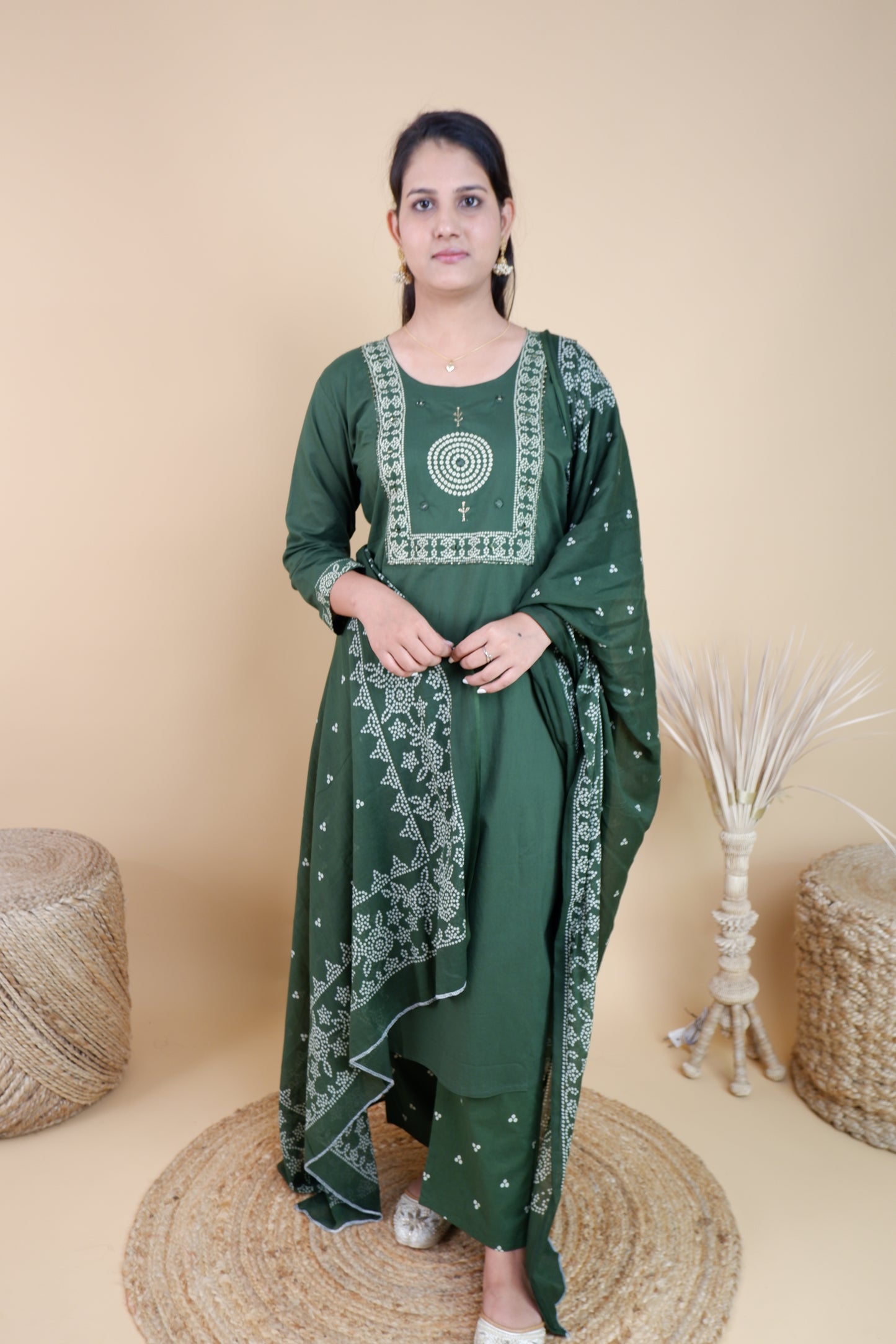 Olive green cotton suit for women with white printed patterns worn by model with matching dupatta