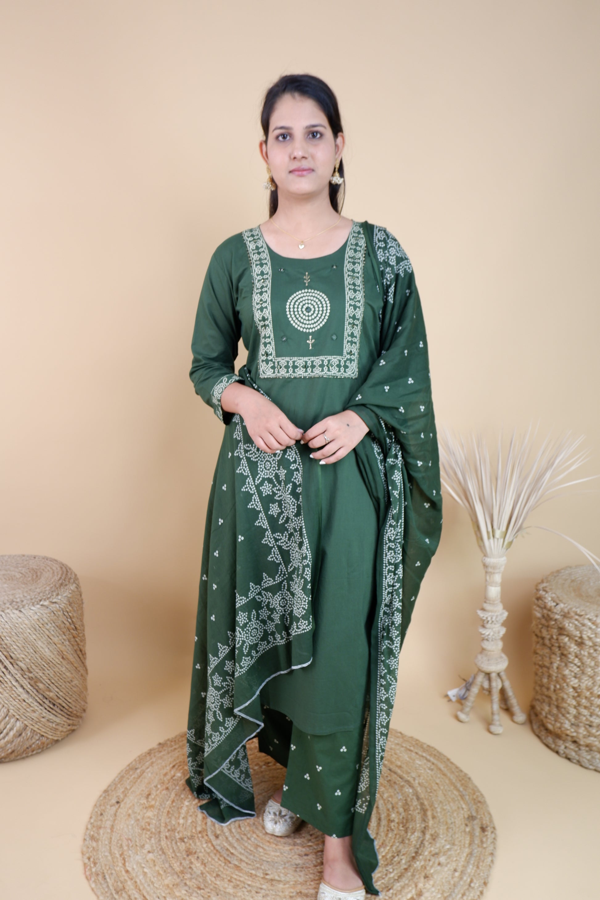 Olive green cotton suit for women with white printed patterns worn by model with matching dupatta