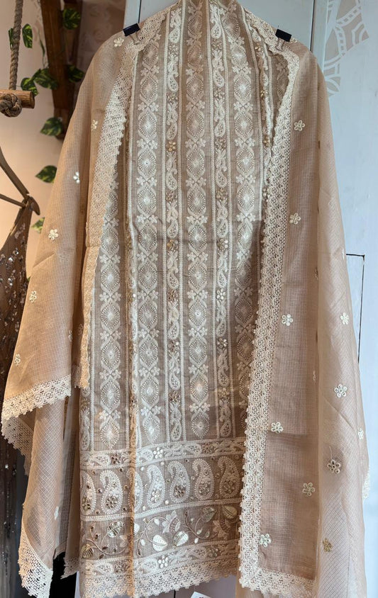 Beige pure cotton kota doria fabric with intricate white embroidery and floral patterns
