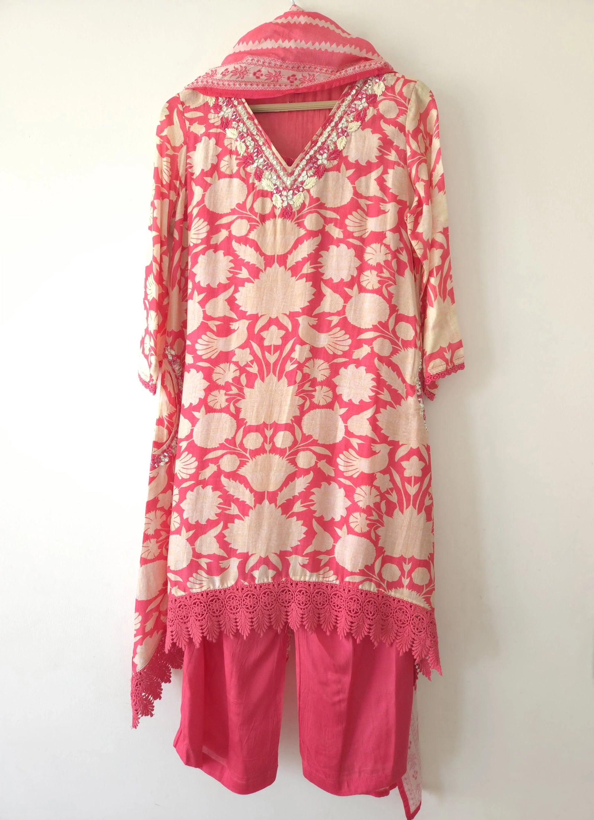 Pink and cream floral pure muslin stitched suits with lace detailing and matching pants