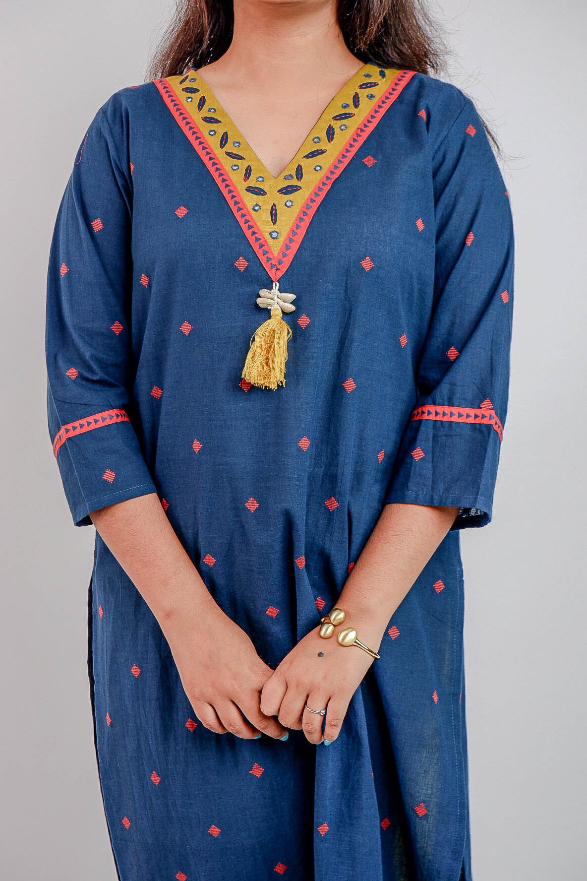 DH209-Blue Handloom Cotton Kurti with Embroidered V-Neck and Tassel Detail