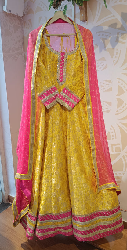 DH218-Radiant Yellow Anarkali With Pink Dupatta & Golden Highlights