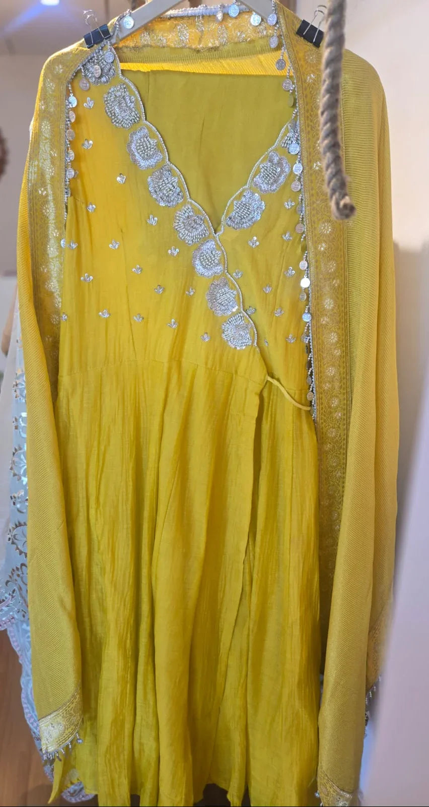Yellow embroidered angrakha set with silver detailing and matching dupatta from Dharini's Store