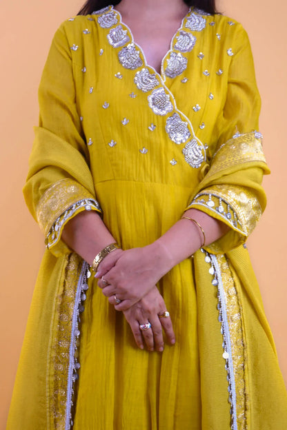 Yellow embroidered angrakha set with silver floral embroidery and detailed sleeve and border design